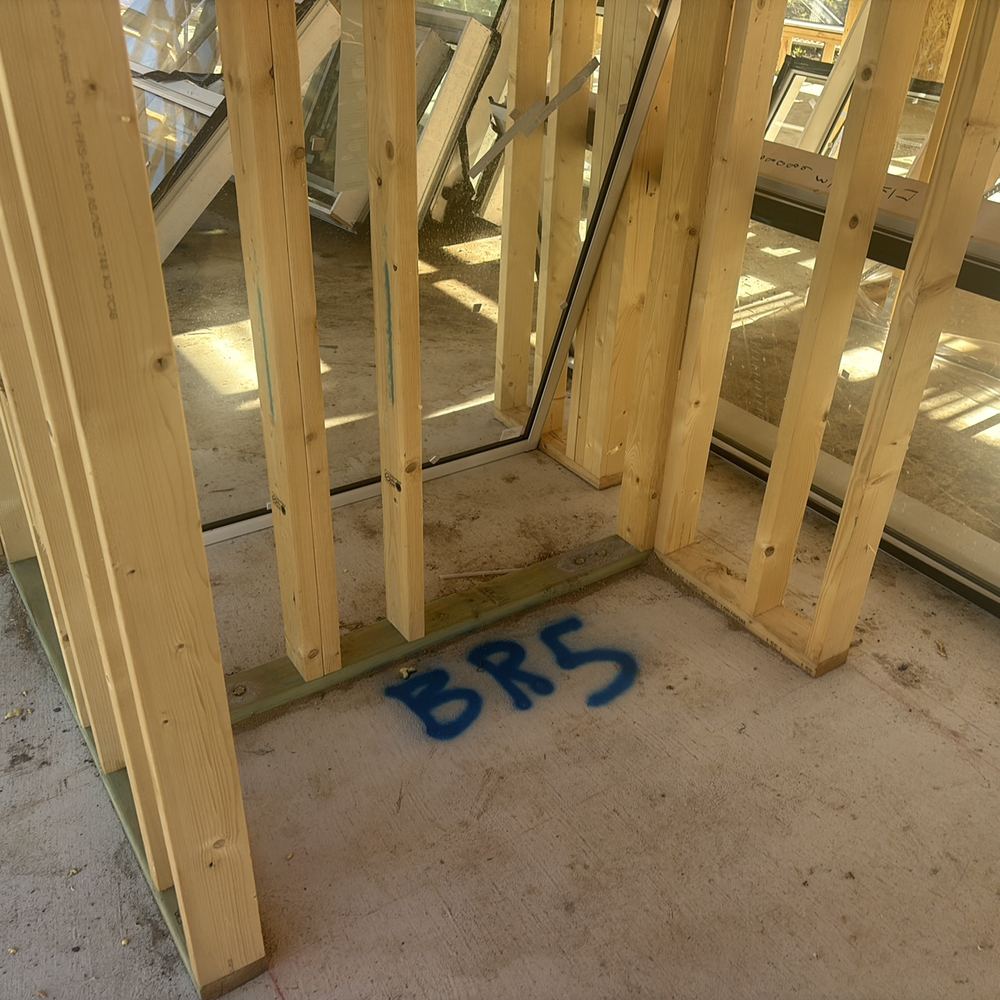 Wall marked for bracing on the plans, with the bracing itself not yet installed, found during a frame inspection in Kalkallo